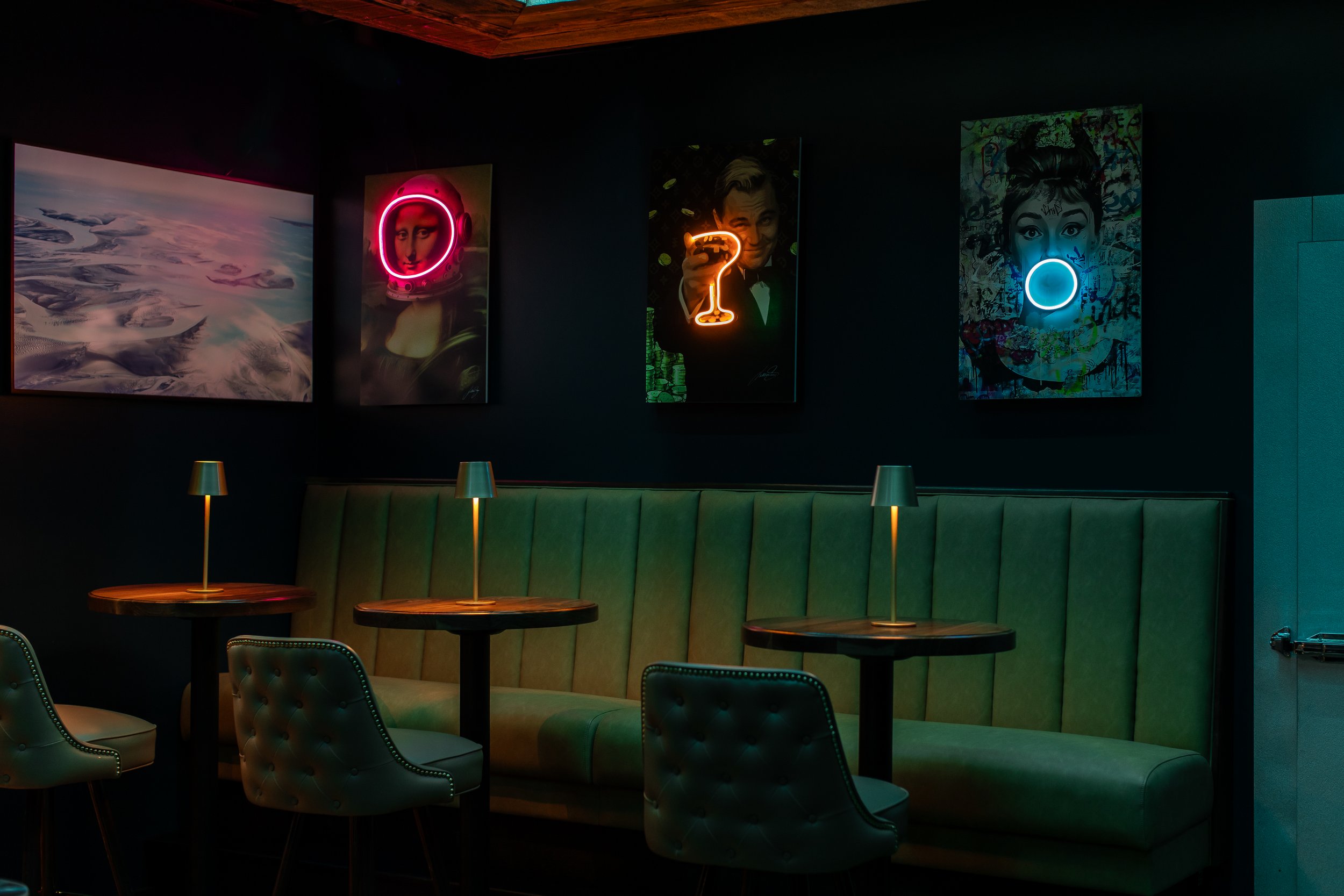 Darkly light back tables in The Bunker