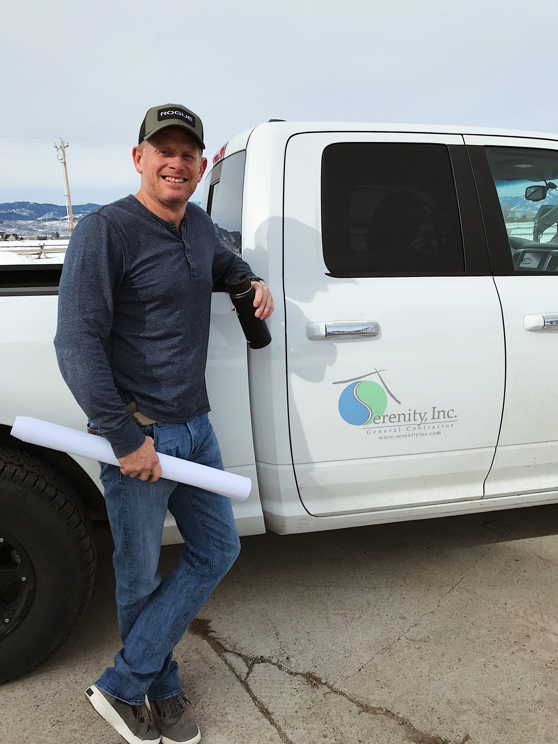 Jeremie Moore standing next to Serenity Inc truck